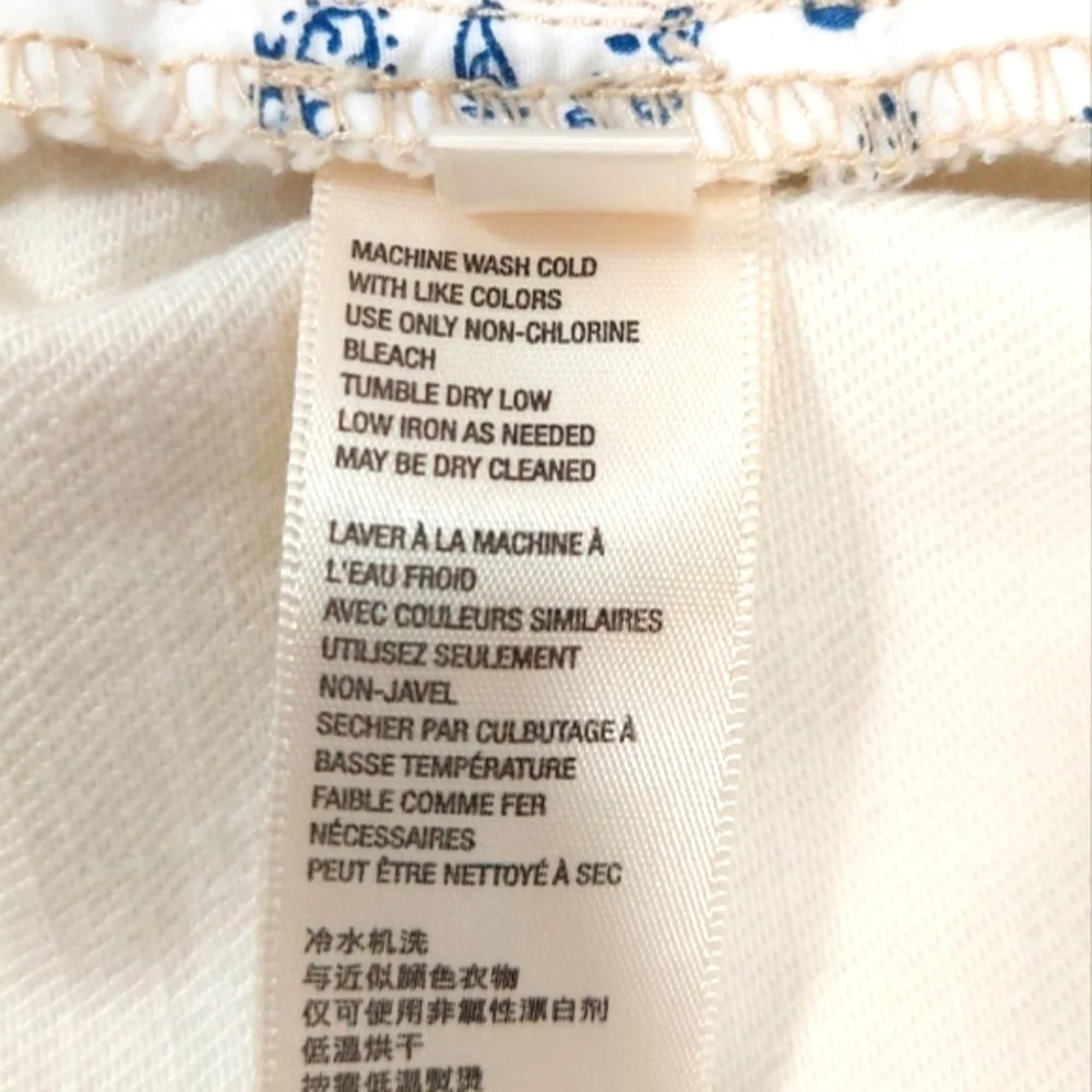 We The Free White High-Waisted Raw Hem Loose Fit Shorts